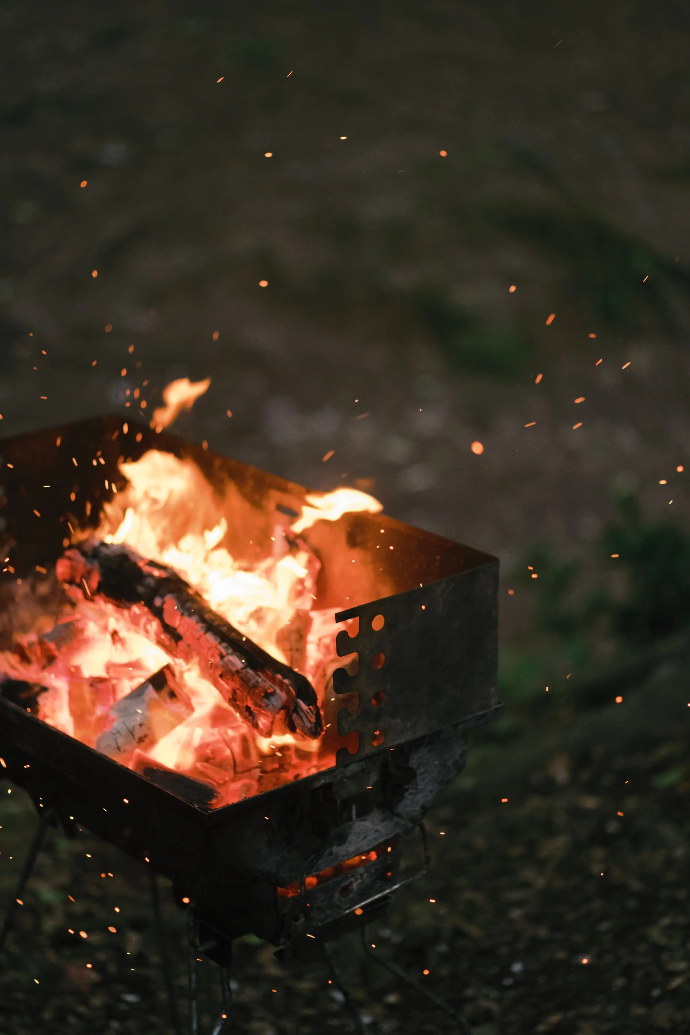Charcoal burning down to embers in the hearth at Beirut Bodega